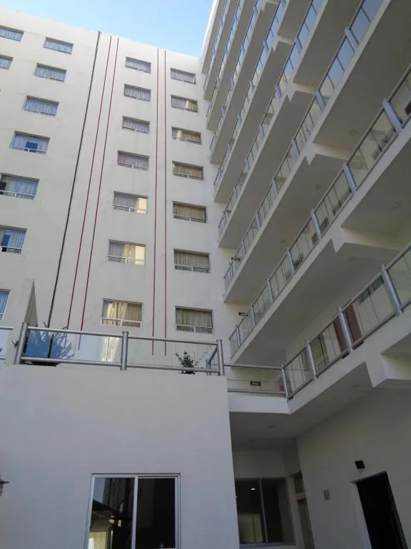 Hotel RRU Puebla building and courtyard